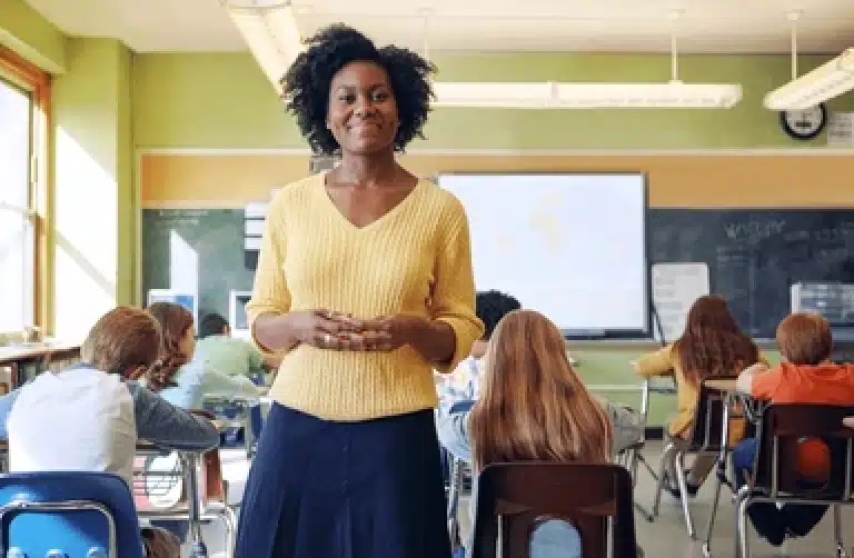 A teacher working with students